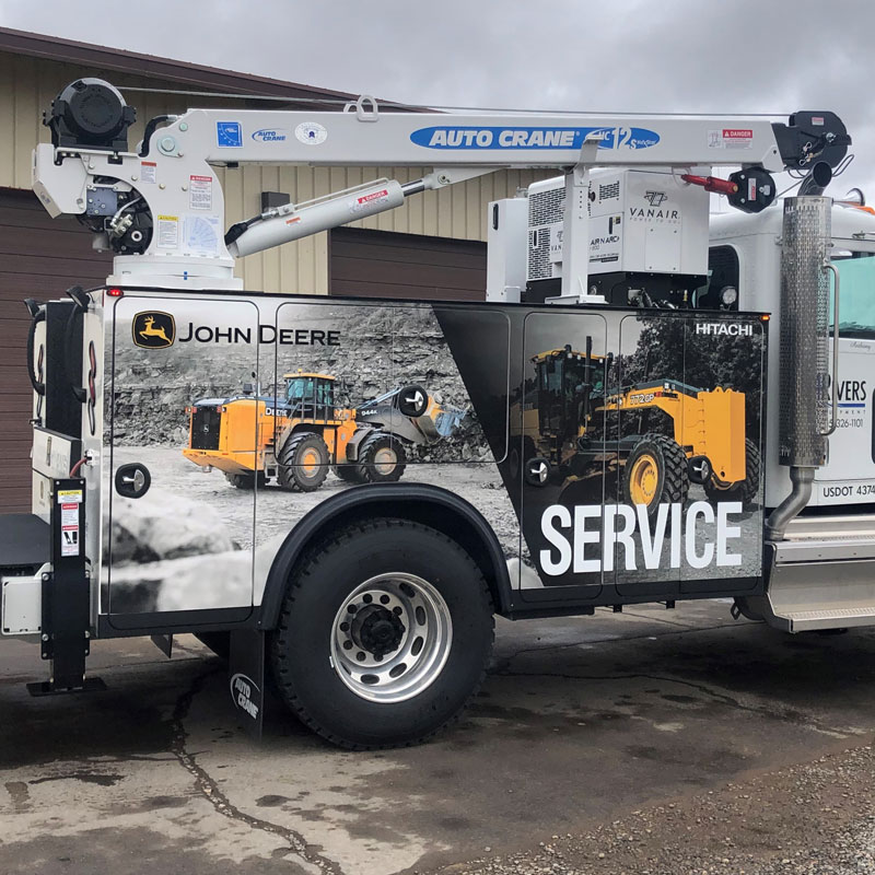 Auto Crane body mounted on a Largo flatbed for lifting and service operations